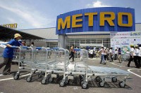 Dividend Scrapped, As 2014 Forecast Rises At Metro Group
